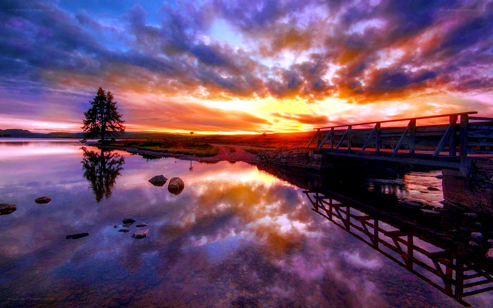 Sunset over a wooden bridge