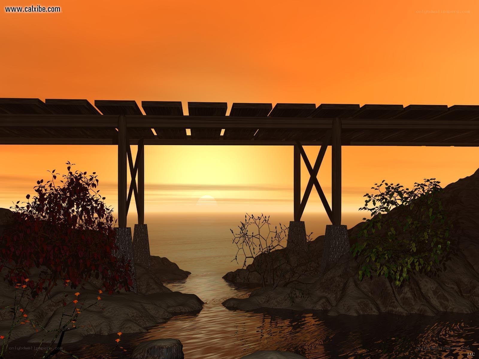 sunset over a wooden bridge