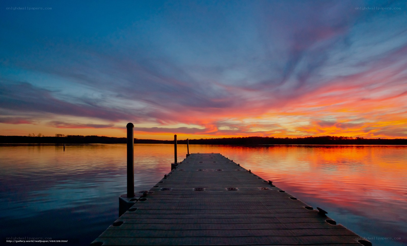 Sunset over a wooden dock