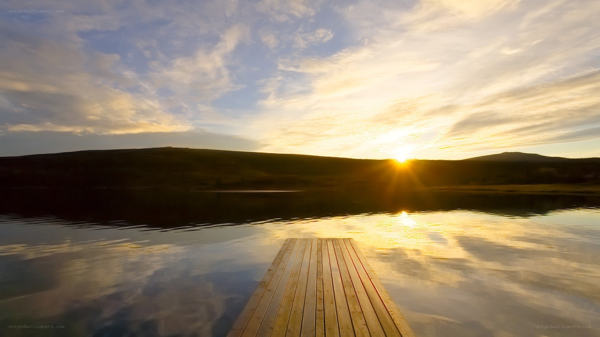 Sunset over a wooden dock