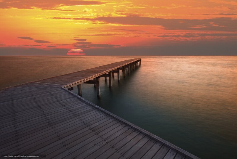 Sunset over a wooden pier