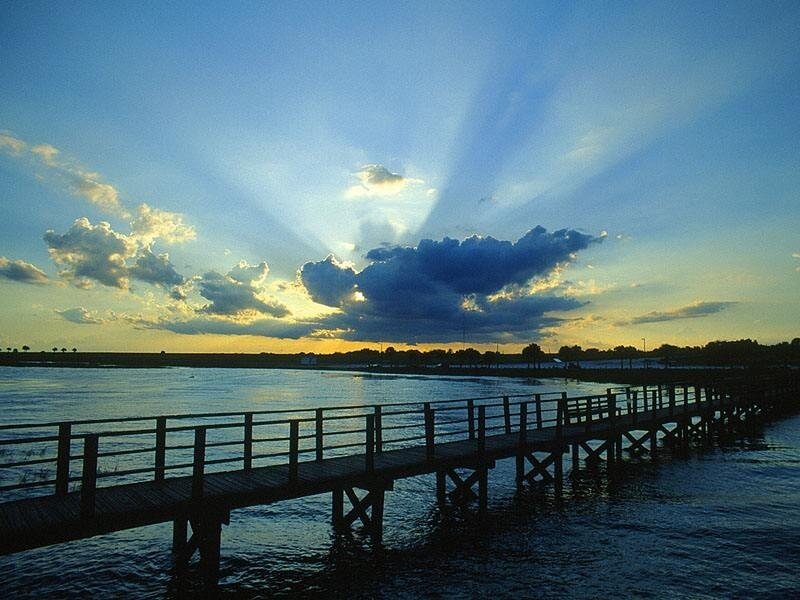 Sunset over a wooden pier
