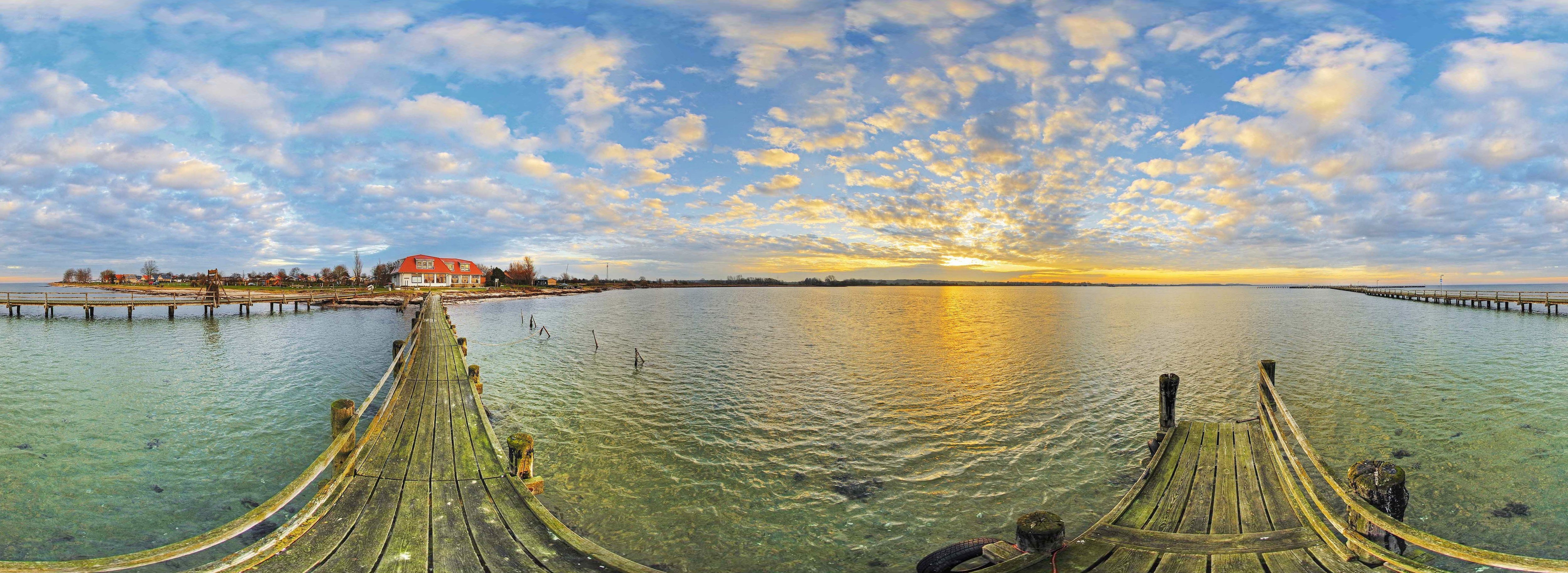 Sunset over a wooden pier