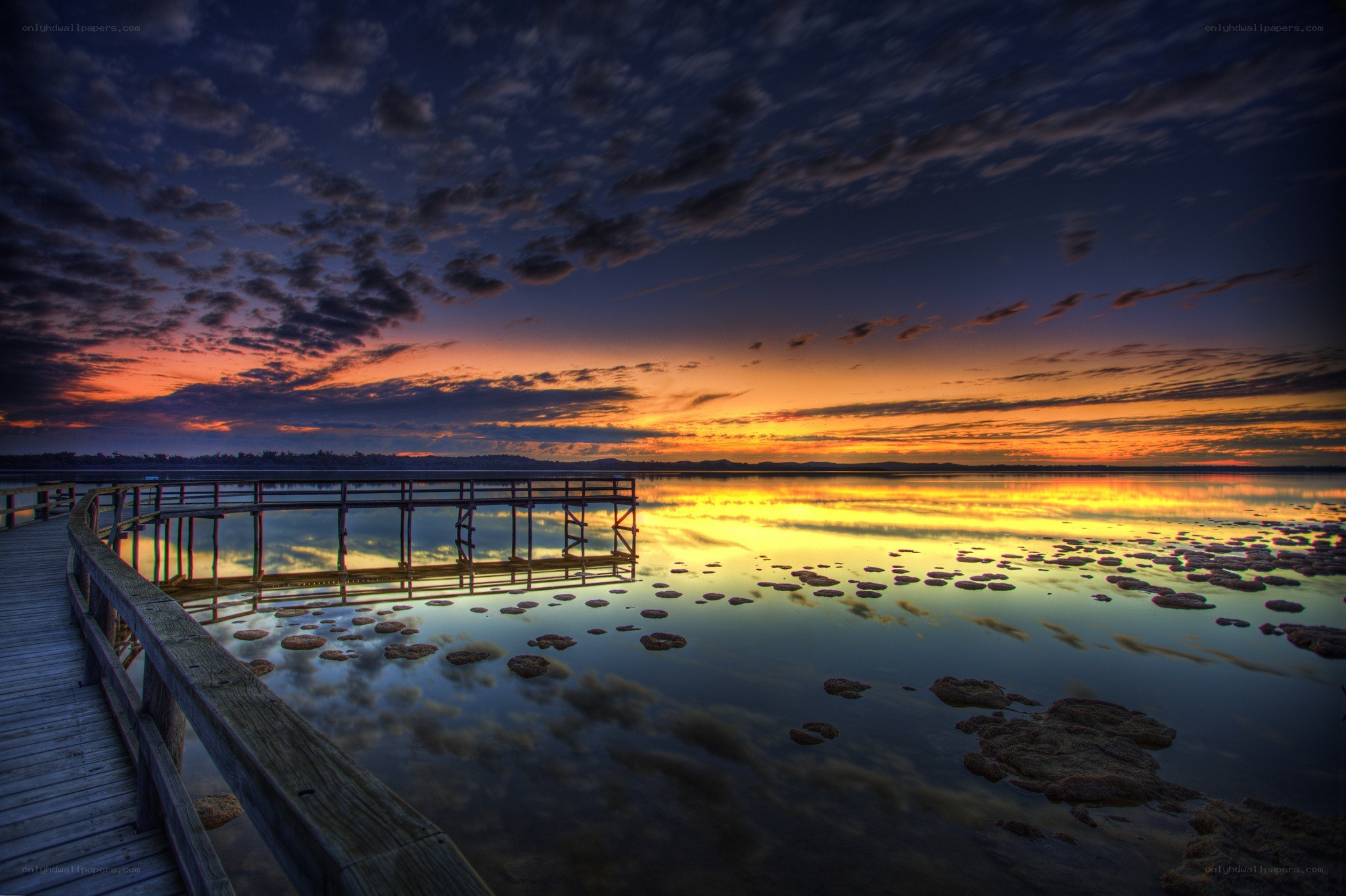 Sunset over a wooden pier