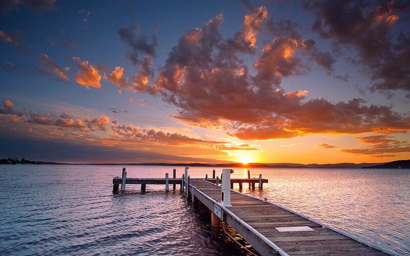 Sunset over a wooden pier