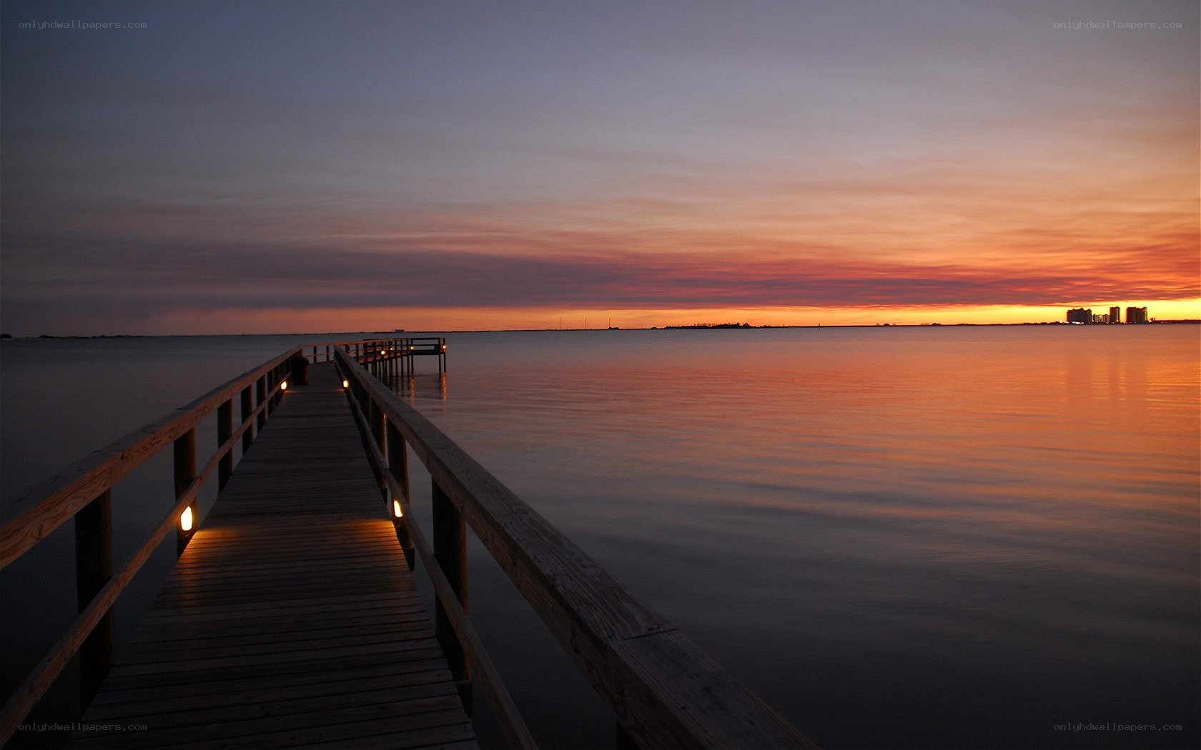 Sunset over a wooden pier