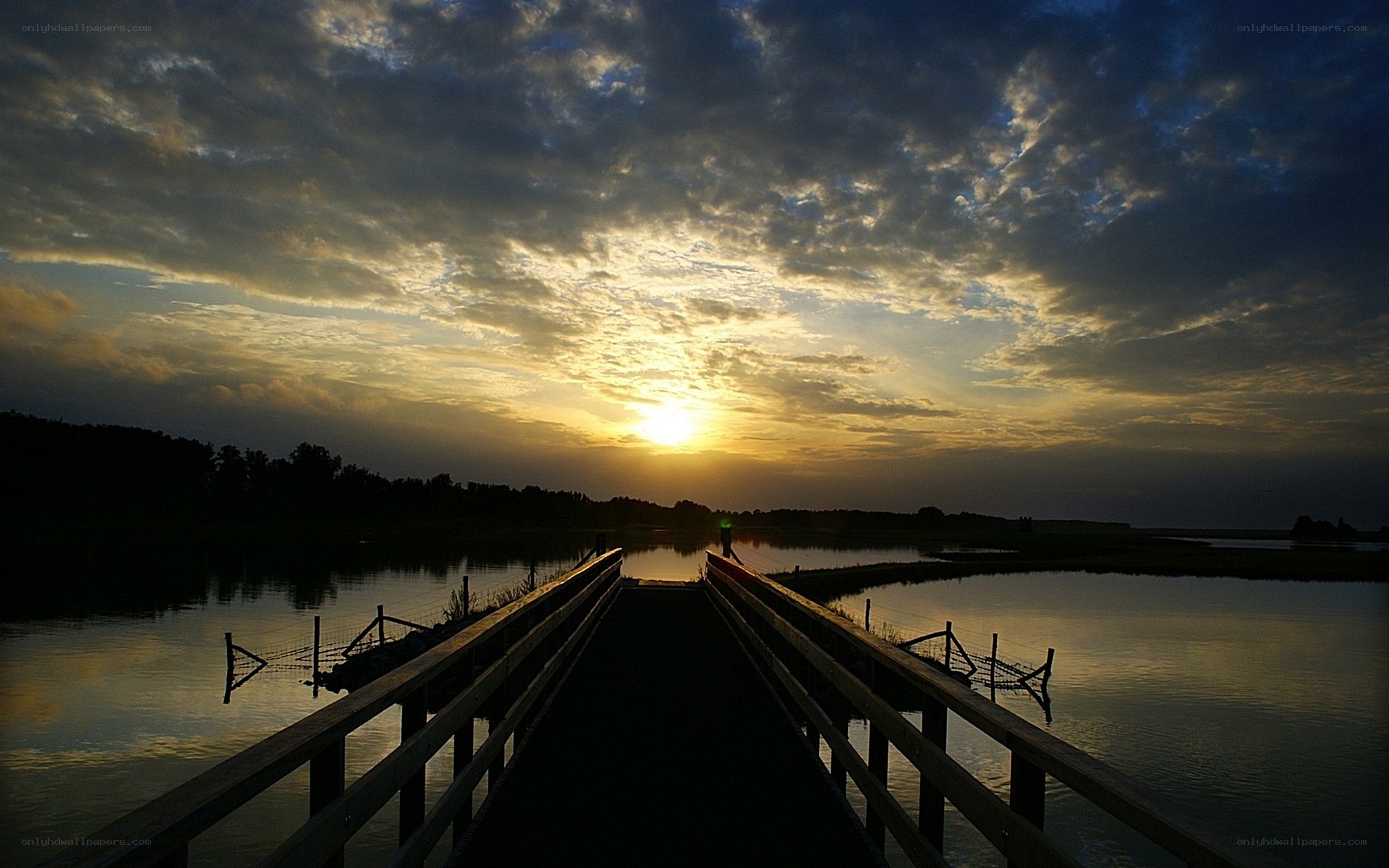 Sunset over a wooden pier