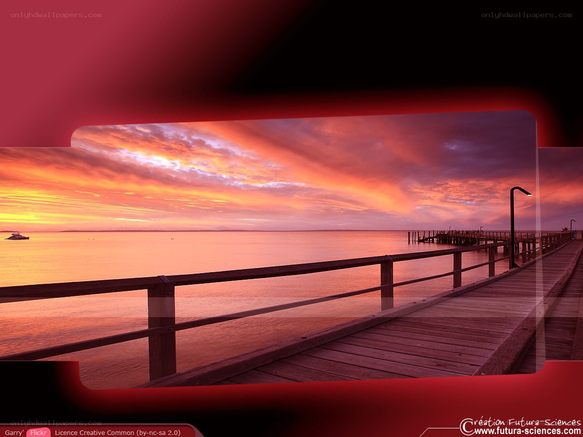 sunset over a wooden pier