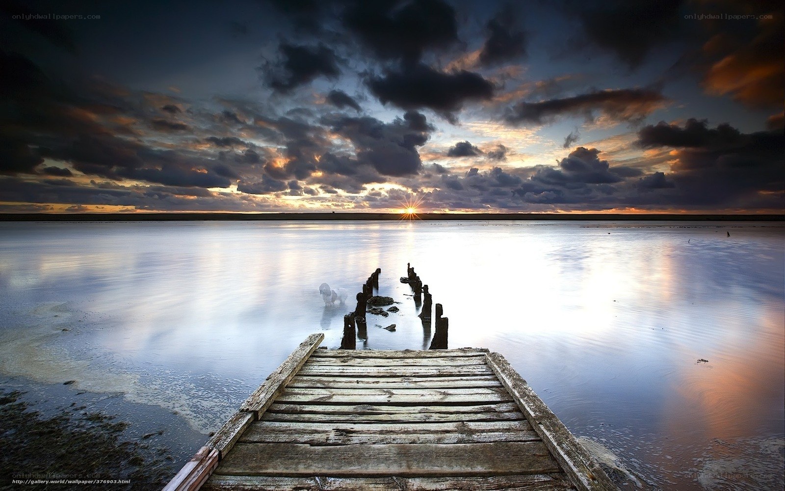 Sunset over a wooden pier