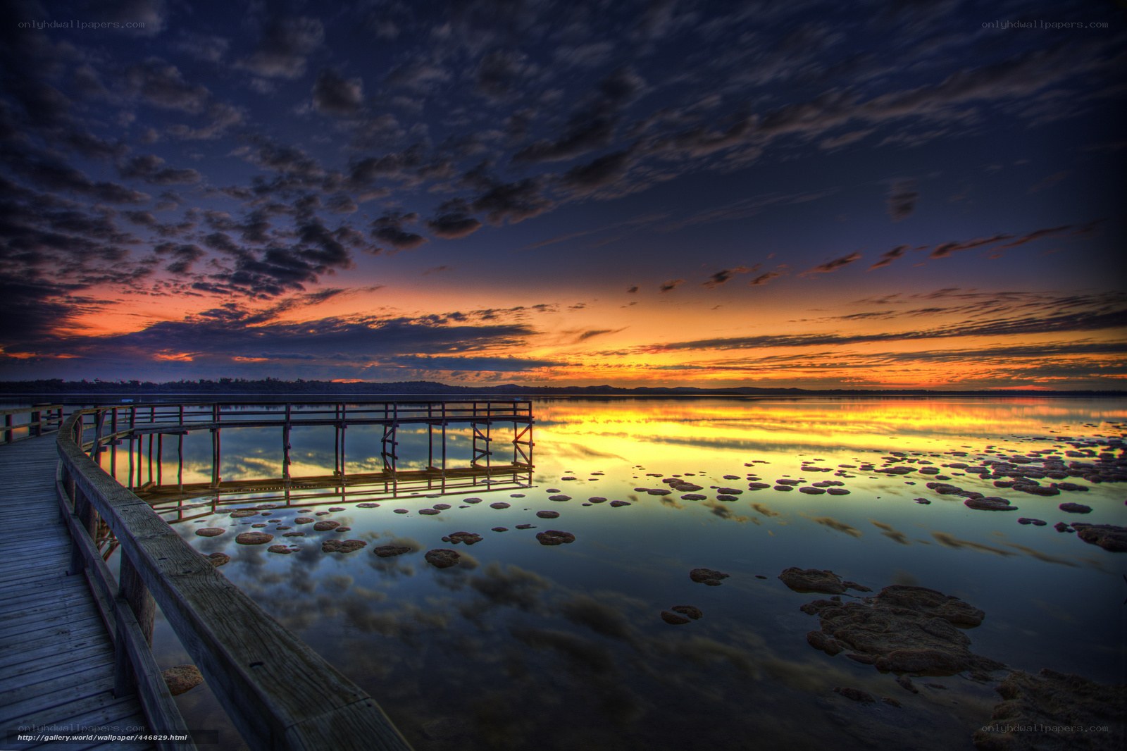 Sunset over a wooden pier
