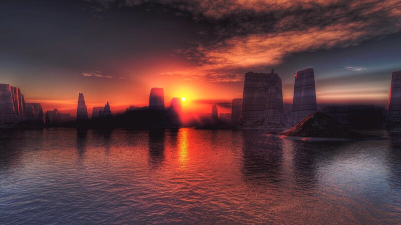 sunset over alien rock formations
