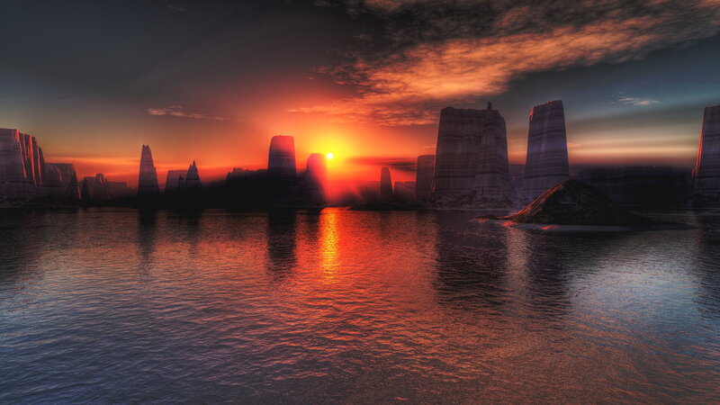 sunset over alien rock formations
