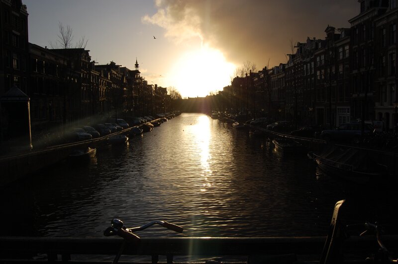 Sunset over Amsterdam canal