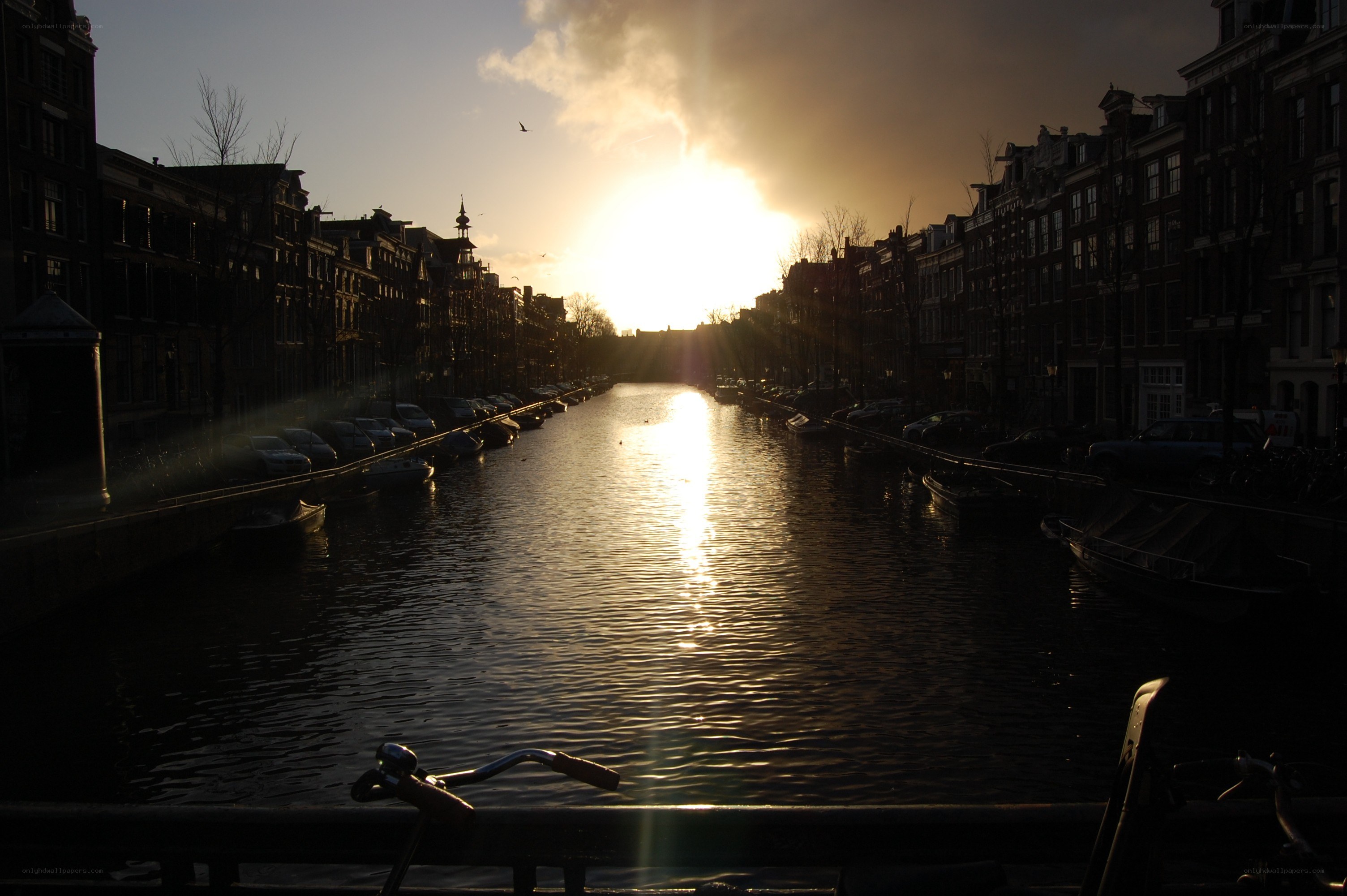 Sunset over Amsterdam canal
