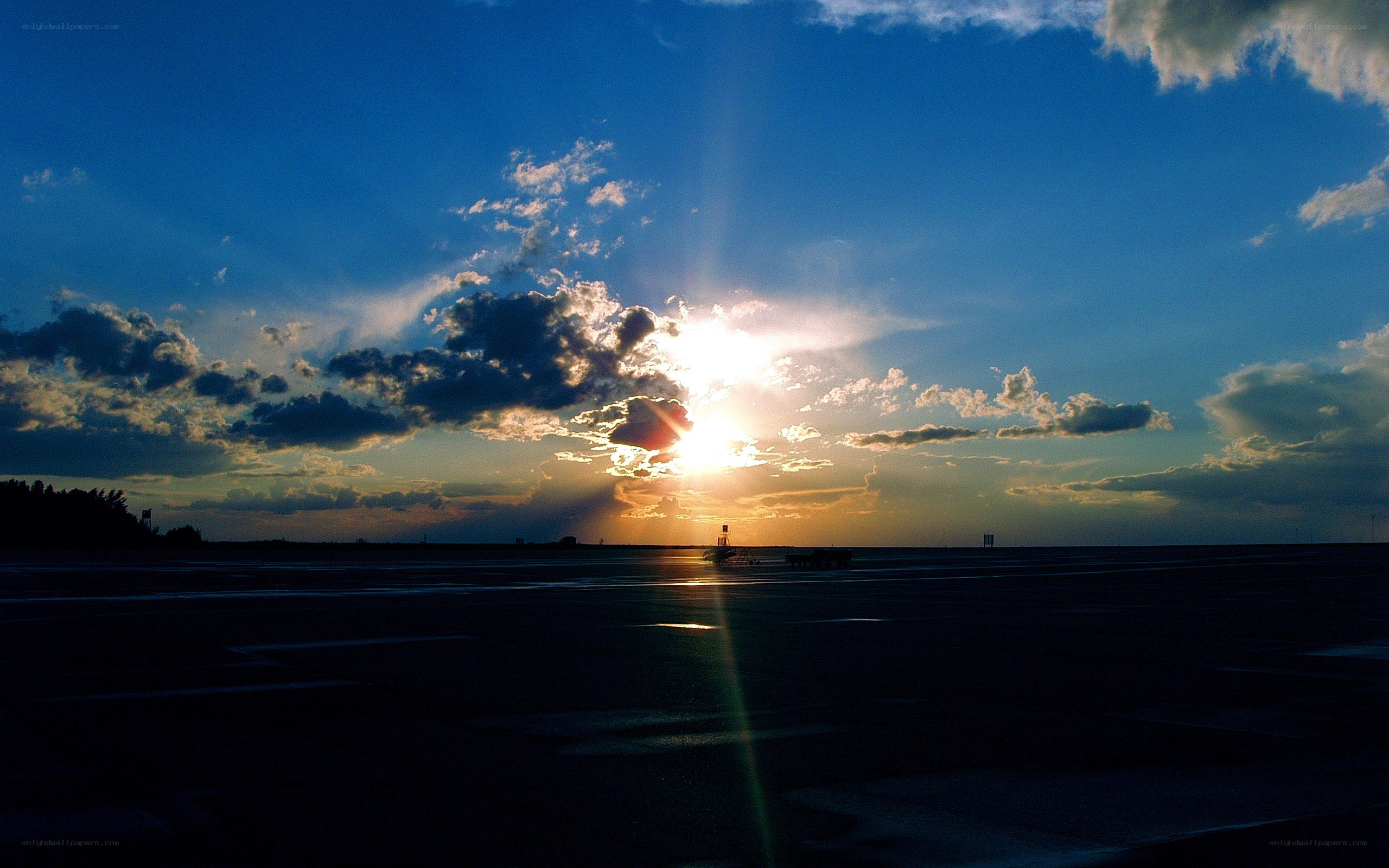 Sunset over an airport runway
