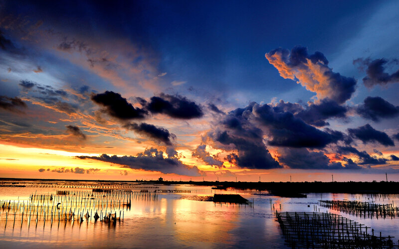 Sunset over Aquaculture Farm — Blue
