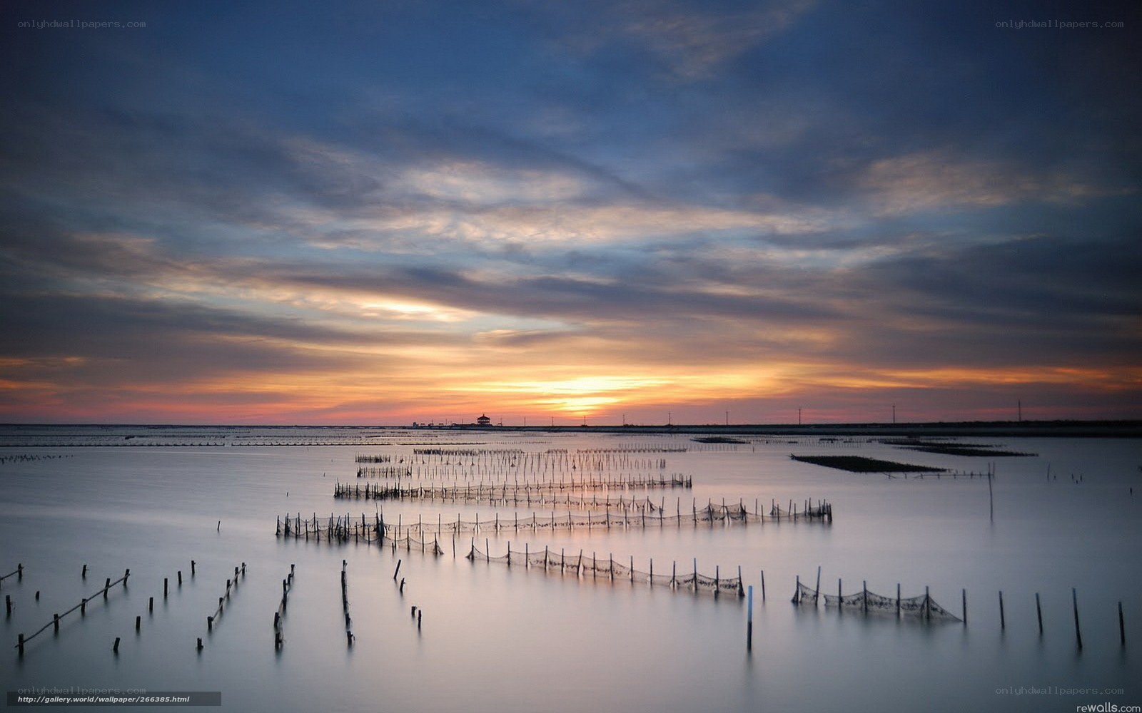 Sunset over aquaculture farm