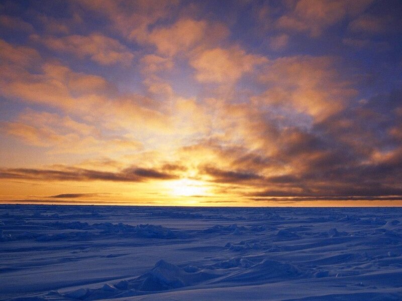 sunset over arctic ice