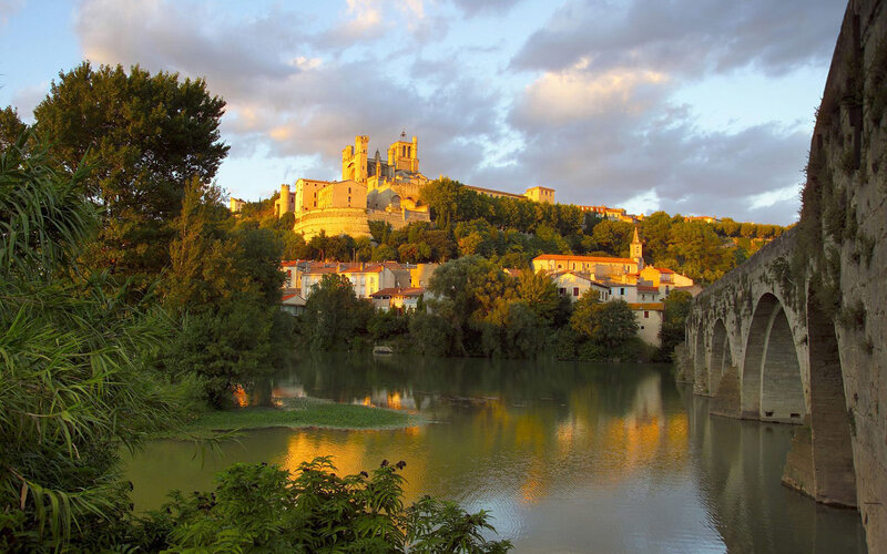 Sunset over Avignon's historic cityscape