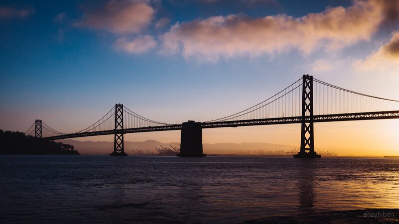 Sunset over Bay Bridge — Blue, Serene, Photograph, Water, Sky, City