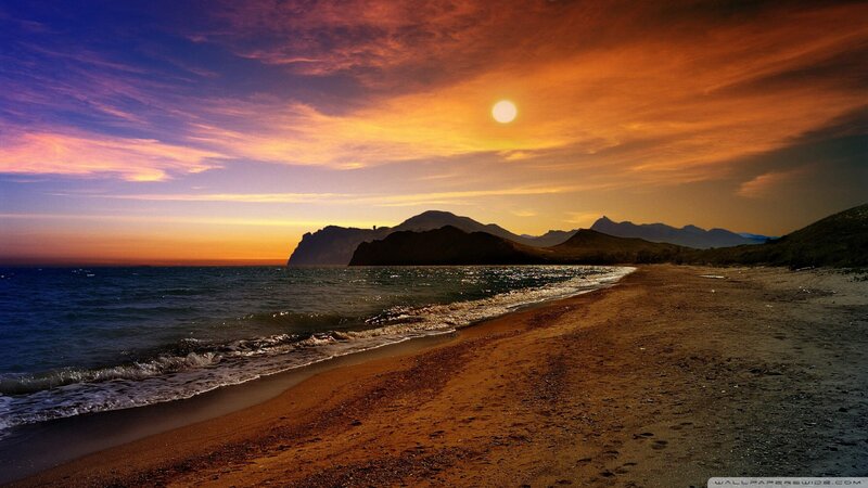 Sunset over Beach and Sea