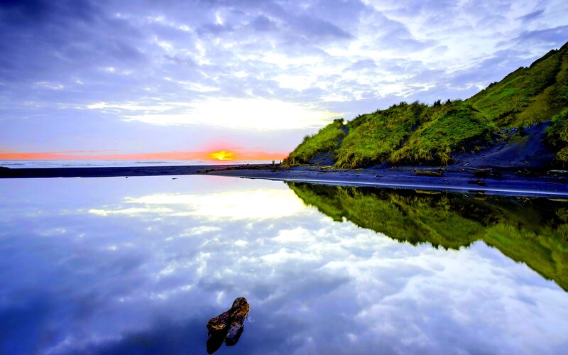 Sunset over Beach — Blue, Serene, Photograph, Clouds