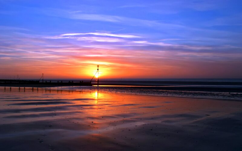 Sunset over Beach — Blue, Serene, Photograph, Pier
