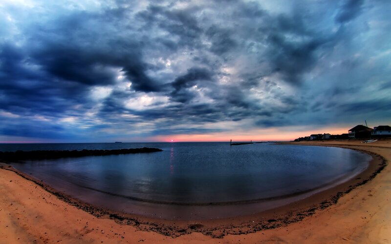 Sunset over Beach Cove — Blue, Dramatic, Photograph