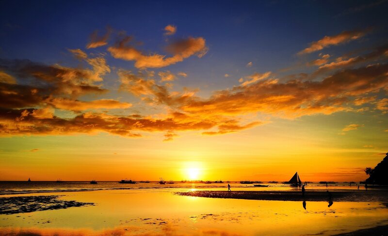 Sunset over Beach — Orange, Dramatic, Photograph, Boats