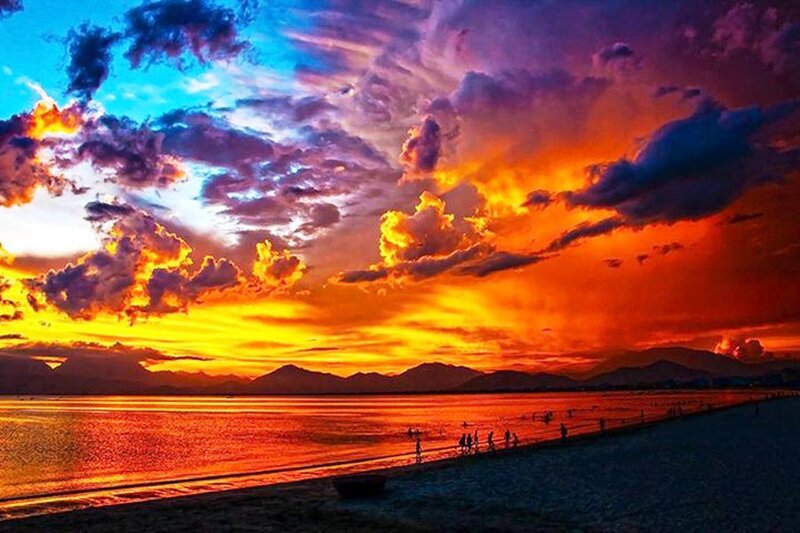 Sunset over Beach — Orange, Dramatic, Photograph, Clouds, Mountains