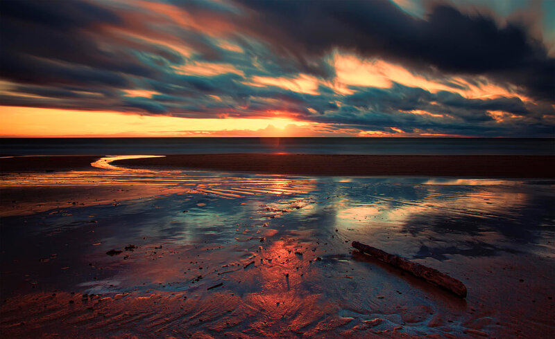 Sunset over Beach — Orange, Dramatic, Photograph, Clouds, Sand