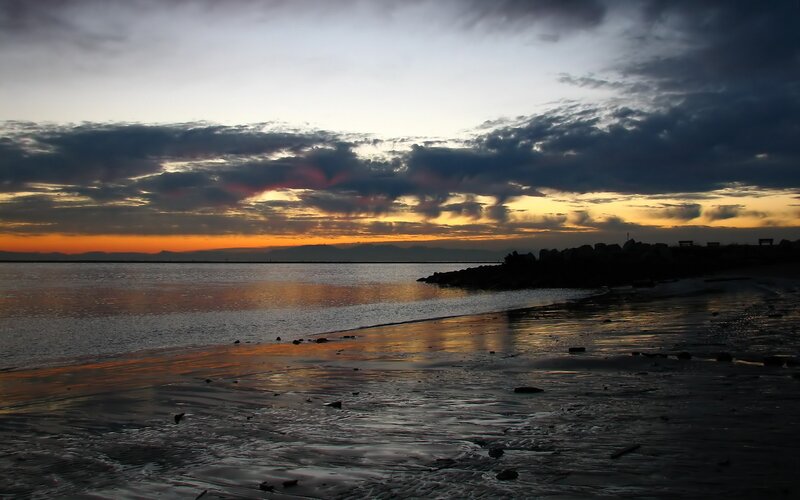 Sunset over Beach — Orange, Dramatic, Photograph, Clouds, Sea, Rocks