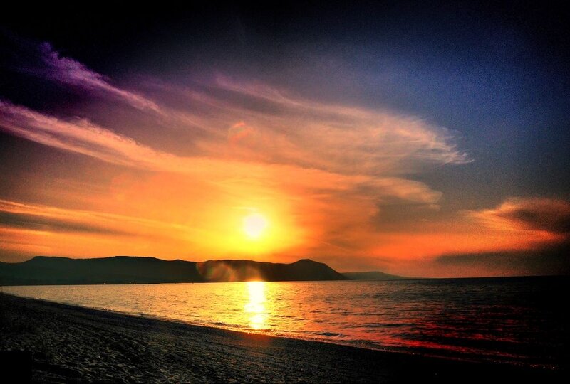 Sunset over Beach — Orange, Dramatic, Photograph, Mountains