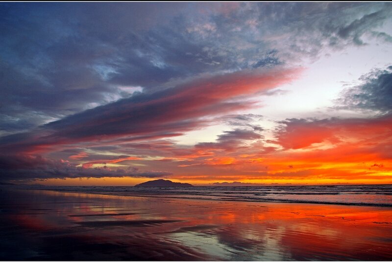 Sunset over Beach — Orange, Dramatic, Photograph, Ocean, Clouds