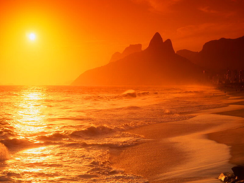 Sunset over Beach — Orange, Dramatic, Photograph, Ocean, Mountains