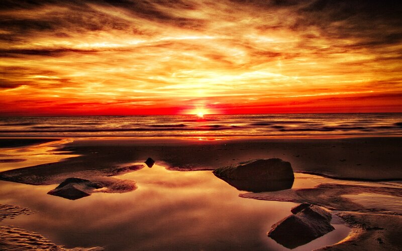 Sunset over Beach — Orange, Dramatic, Photograph, Ocean, Rocks