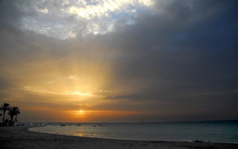 Sunset over Beach — Orange, Dramatic, Photograph, Palm Trees, Boats