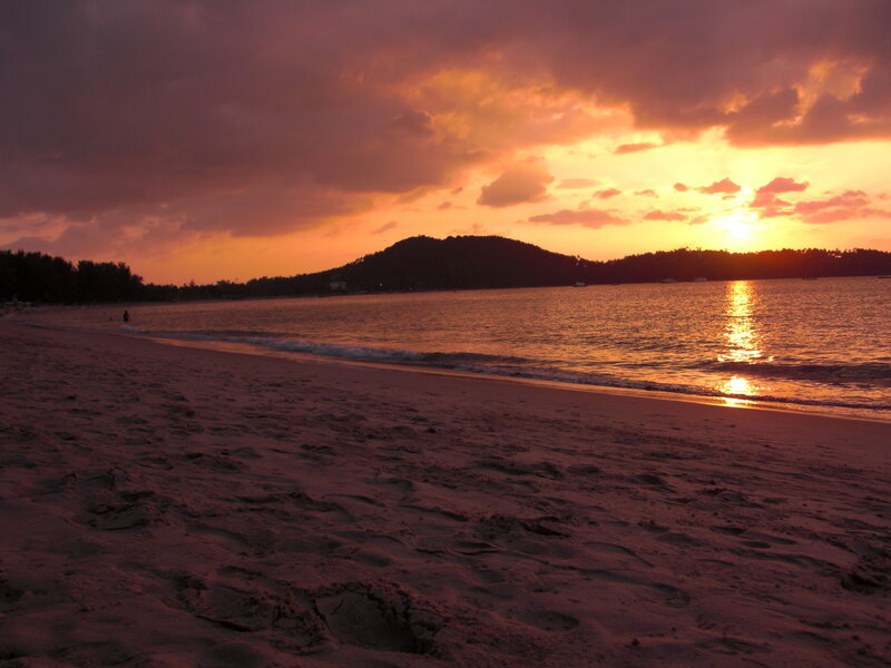 Sunset over Beach — Orange, Dramatic, Photograph, Sea, Mountain