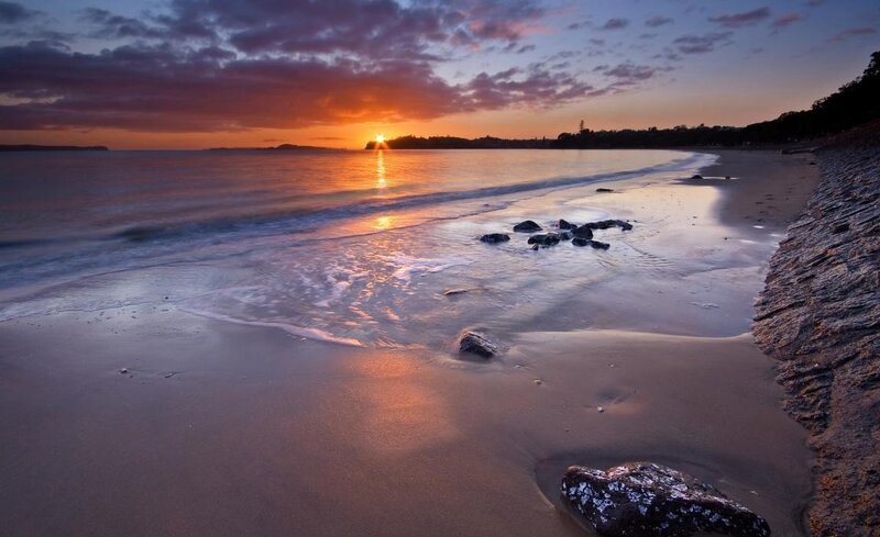 Sunset over Beach — Orange, Serene, Photograph, Ocean, Rocks