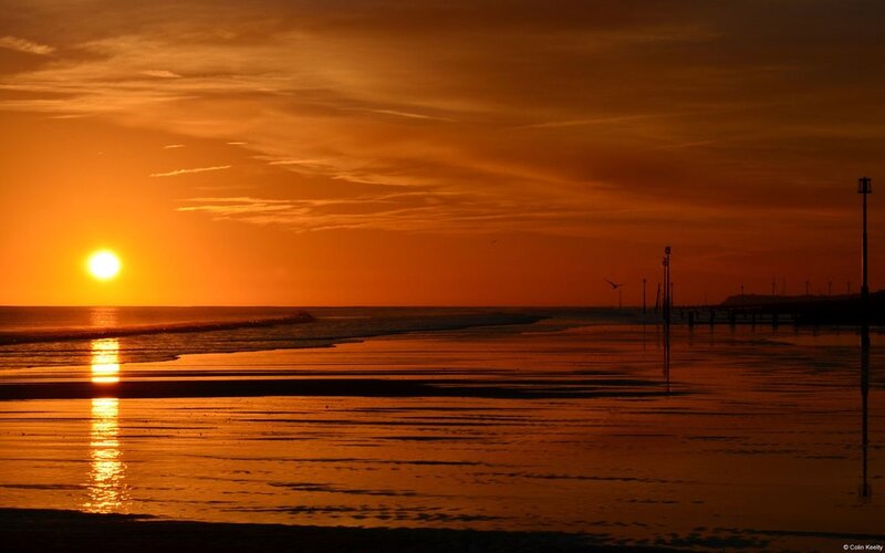 Sunset over Beach — Orange, Serene, Photograph, Sun, Ocean, Pier