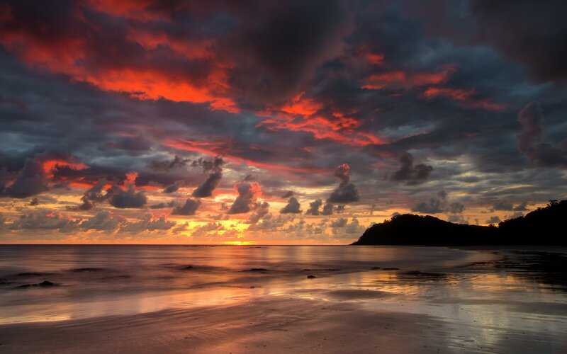 Sunset over Beach — Red, Dramatic, Photograph, Clouds, Ocean, Sand, Orange