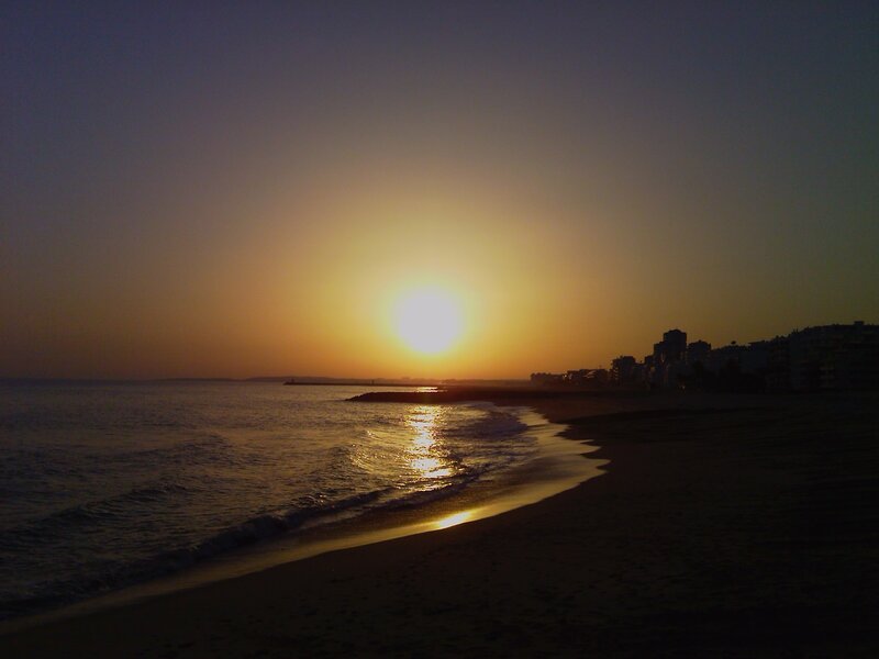 Sunset over Beach — Yellow, Serene, Photograph, Ocean