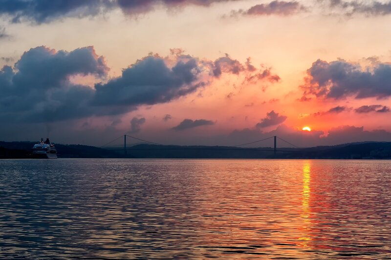 Sunset over Bridge — Orange, Dramatic, Photograph, Ship, Clouds