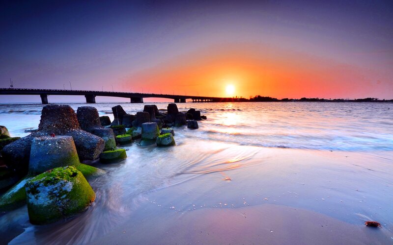 Sunset over Bridge — Orange, Serene, Photograph, Rocks