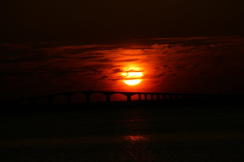 Sunset over Bridge — Red, Dramatic