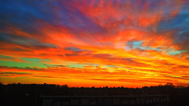 Sunset over Buildings — Orange, Dramatic