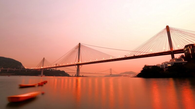 Sunset over Cable-stayed Bridge — Orange, Serene, Photograph, Boats