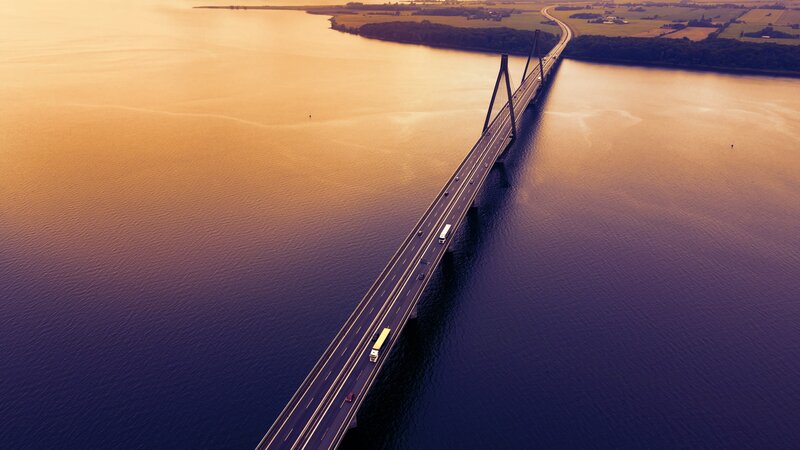 Sunset over Cable-stayed Bridge — Orange, Serene, Photograph, Car