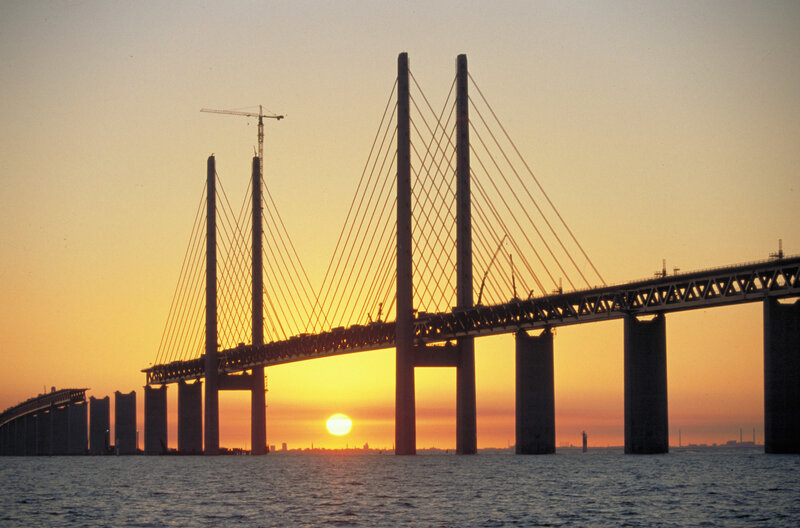 Sunset over Cable-stayed Bridge — Orange, Serene, Photograph, Sun, Crane