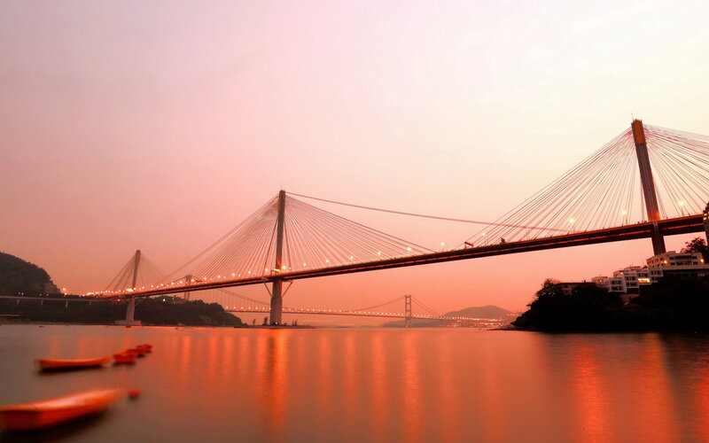 Sunset over Cable-stayed Bridge — Orange, Serene, Photograph, Water